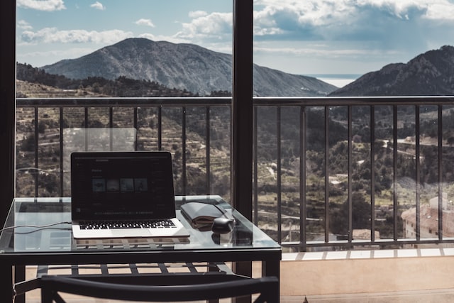 remote working setup overlooking a valley and mountains image at offices.net